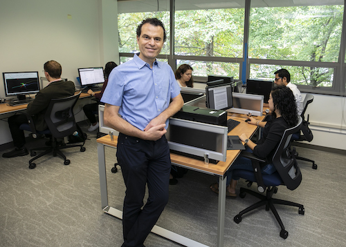 Giorgio Ascoli in his lab with team.